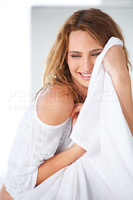 Buy stock photo Beauty, bed and woman with smile in home for sensual, playful and carefree attitude. Happy, blanket and face of sexy person in bedroom with confidence, pride and relaxing in underwear on weekend