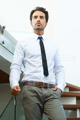 Buy stock photo Corporate, businessman with professional outfit on stairs. Business office worker or accountant, young executive or employee looking focused and elegant with person thinking at workplace on steps