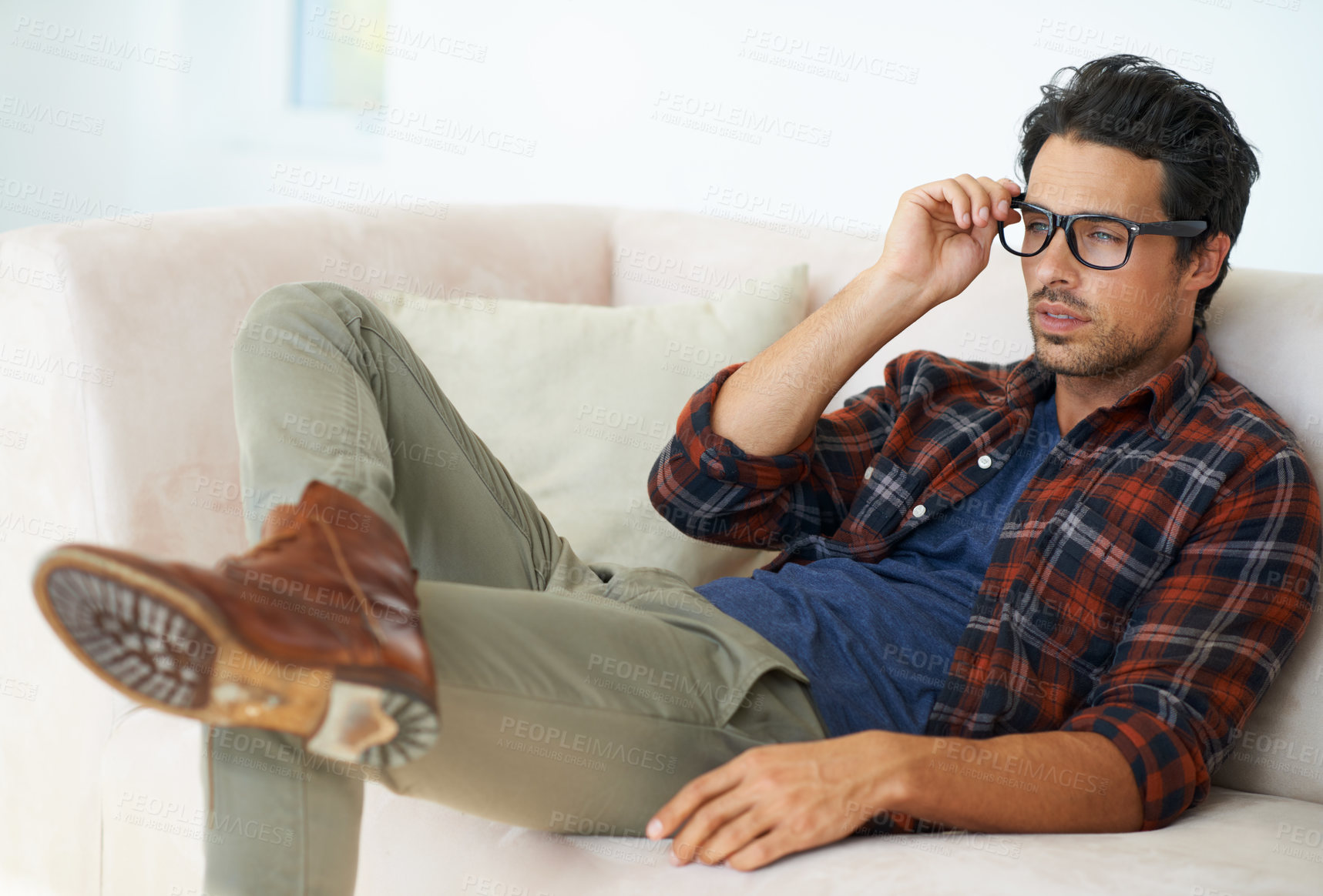 Buy stock photo Home, sofa and man relax with glasses for eyesight and headache from problem with vision in living room. Hipster, person and thinking on couch in apartment with spectacles for farsighted healthcare