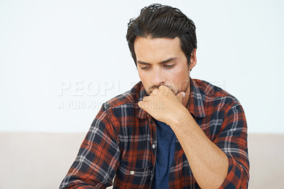 Buy stock photo Man, thinking and serious or hands for question, idea and contemplating in living room of apartment or home. Person, face and mental health or thoughtful on couch in lounge for anxiety or nervous
