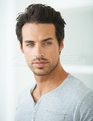 Buy stock photo Head and shoulder shot of a handsome young man looking away