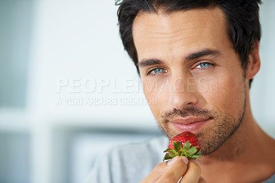 Buy stock photo Man, portrait and strawberry eating for breakfast meal or wellness health, diet nutrition or morning snack. Male person, face and fruit berries for vitamin fibre food for weight loss, vegan or detox