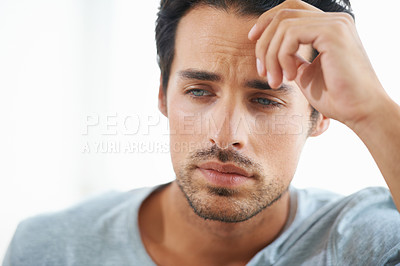 Buy stock photo Sad, stress or worried young man on white background in studio with problem. Anxiety face, mental health and stressed out headache for male person thinking or frustrated from depression on backdrop.