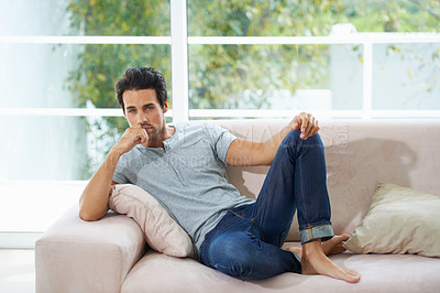 Buy stock photo Man, portrait and sofa relax in home for weekend rest or holiday calm, chill on vacation morning. Male person, face and living room peace or thinking casual confident in apartment, break or comfort