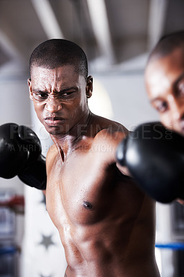 Buy stock photo Fight, black man and boxer with hit in ring together for fitness, power strike and training challenge. Strong body, punch in face and fearless athlete in gym with action and confidence in competition