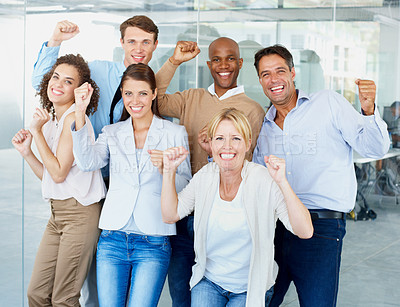 Buy stock photo Business people, portrait and fist in celebration for success, winning or teamwork at office. Group of employees with smile in happiness for team win, victory or achievement for goals at workplace