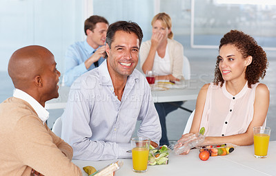 Buy stock photo Portrait, lunch and a happy business team eating food during their break in the office at work. Diversity, friends or colleagues with a man and woman employee group enjoying a meal in the cafeteria