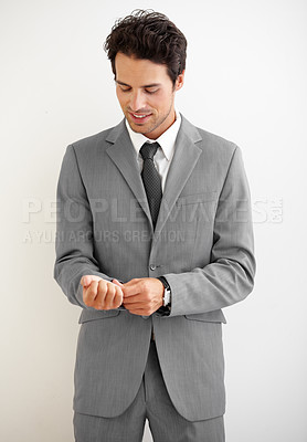 Buy stock photo Businessman, suit and ready with clothes in studio for fashion mock up on white background. Corporate, male manager or boss in formal, cool or modern style for professional, career or job in space