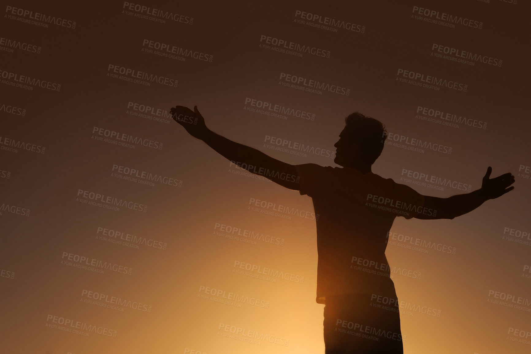 Buy stock photo Silhouette of a man with his arms outstretched - copyspace