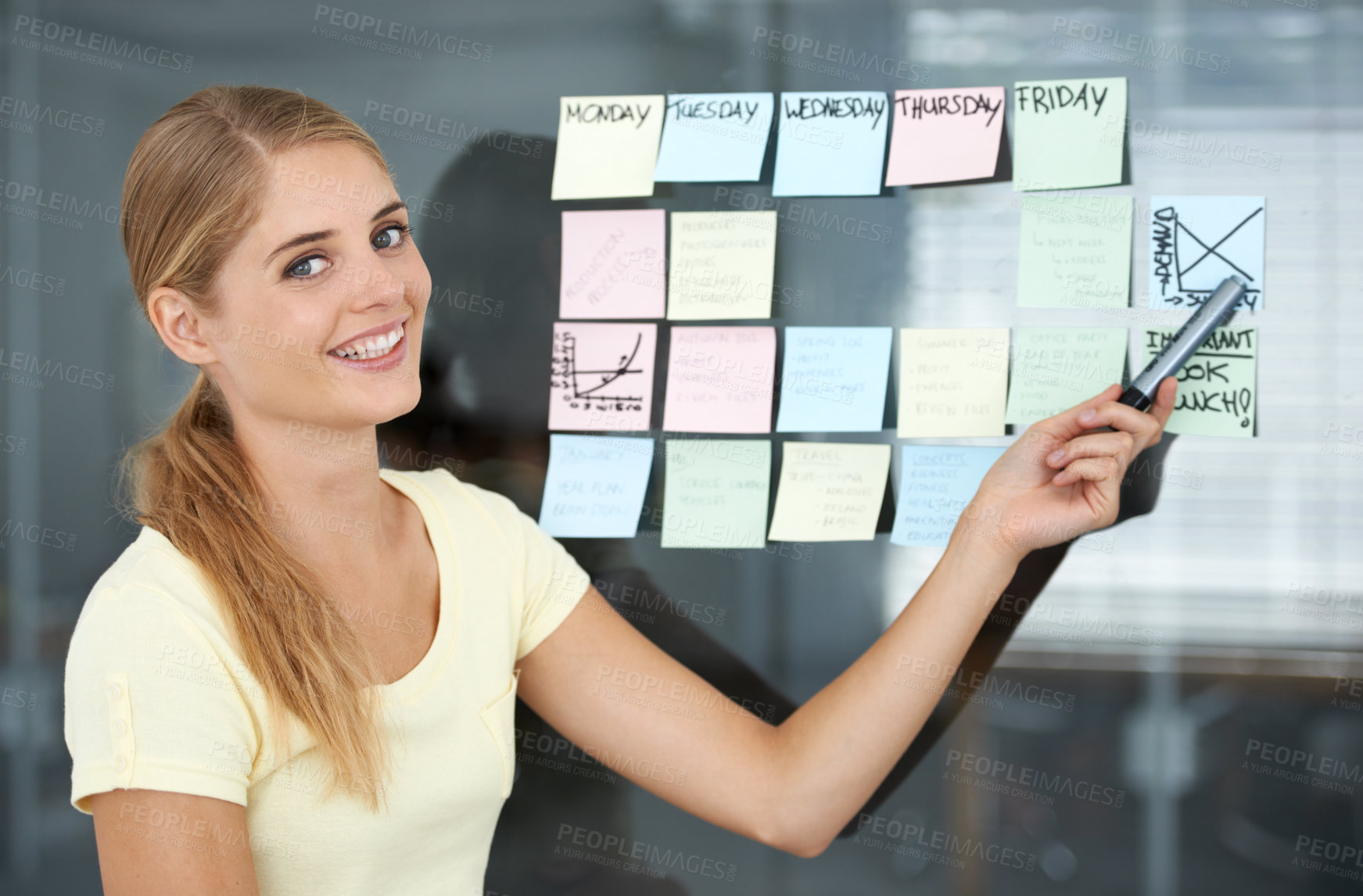Buy stock photo Woman, pointing and sticky notes on glass wall, graph and smile for seminar, creative and portrait. Presentation, strategy and office job for weekly schedule, workplace and financial audit report