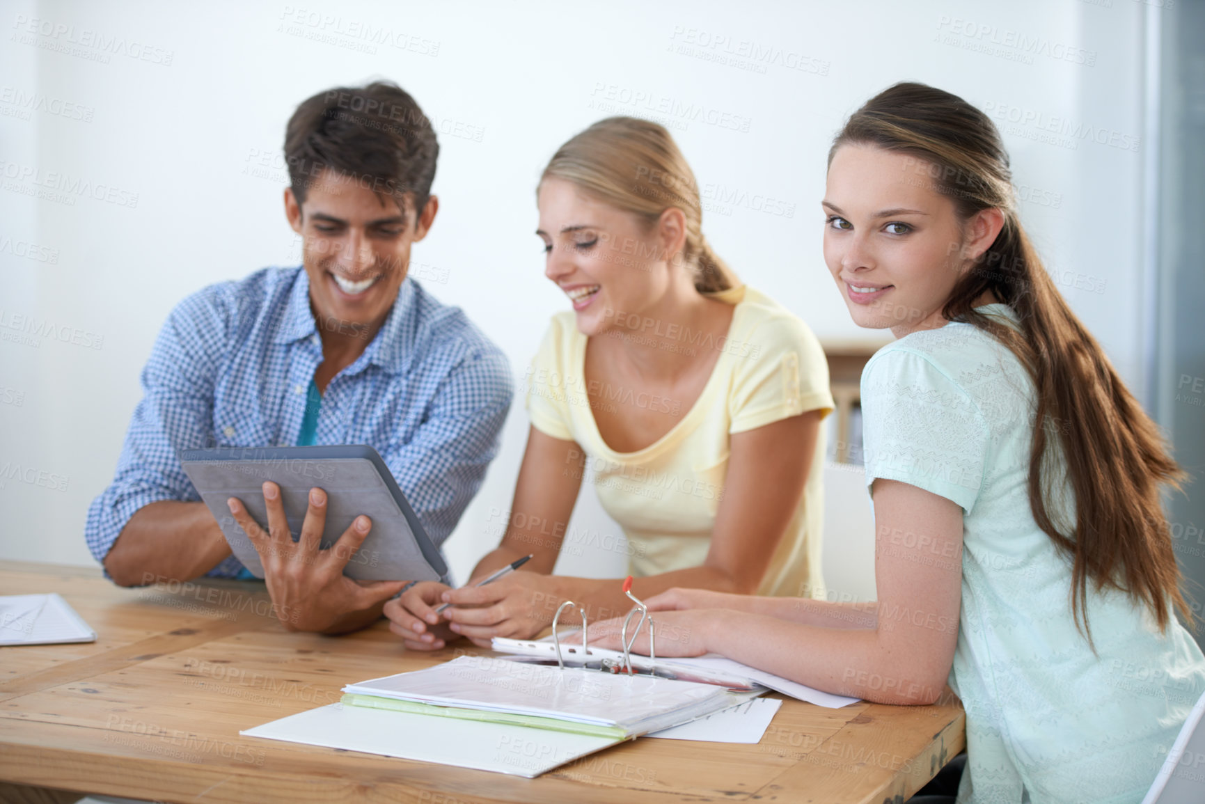 Buy stock photo Woman, business meeting and portrait with tablet, looking and planning with coworkers. Man, women and technology for teamwork, working or project for conversation, workplace and professional
