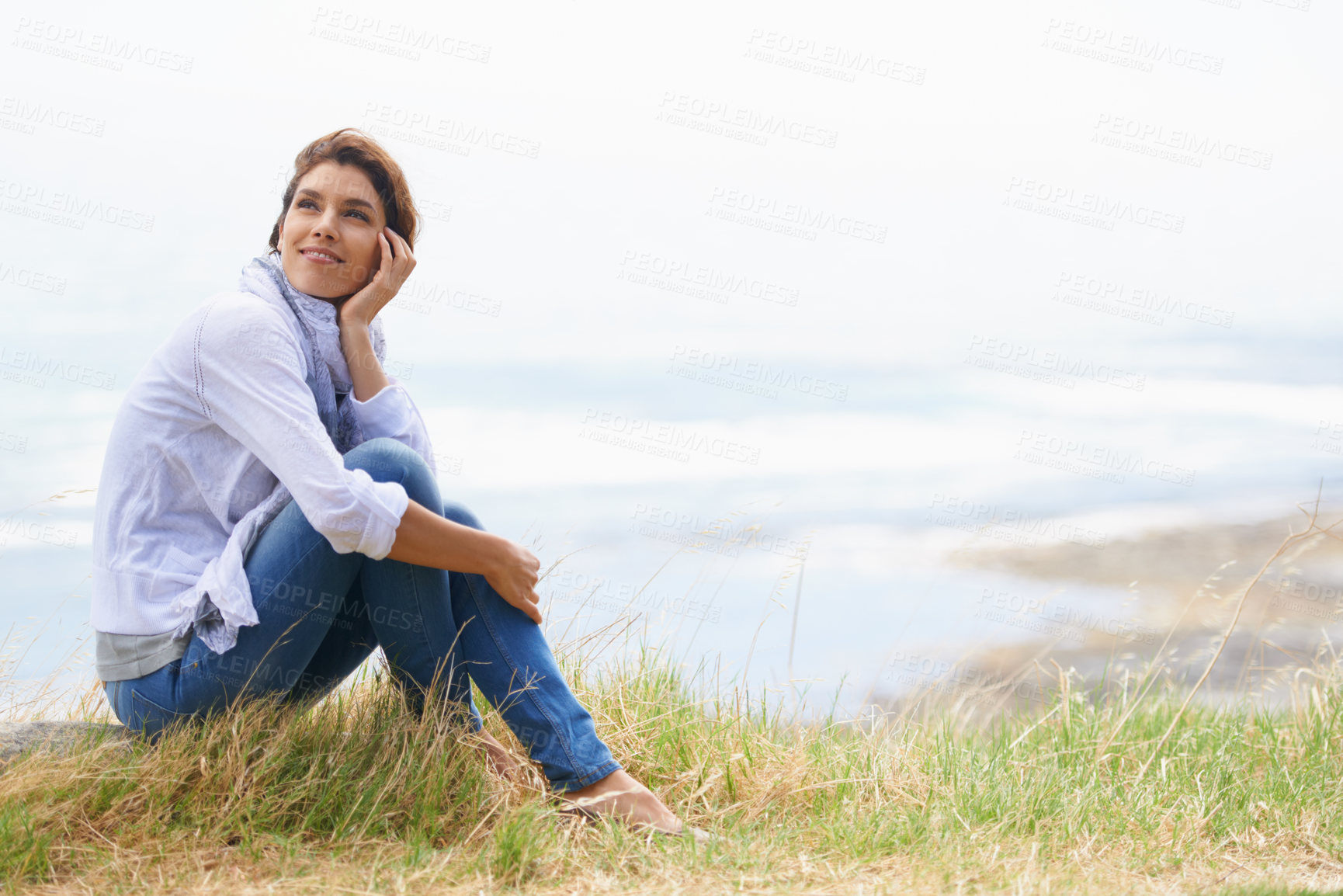 Buy stock photo Old woman, thinking and landscape in nature with happiness, gratitude and peace on holiday or vacation. Retirement, mock up and person relax on hill at the beach, ocean or sea with ideas for future