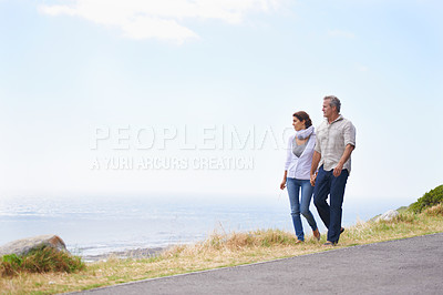 Buy stock photo A happy mature couple with their heads together affectionately