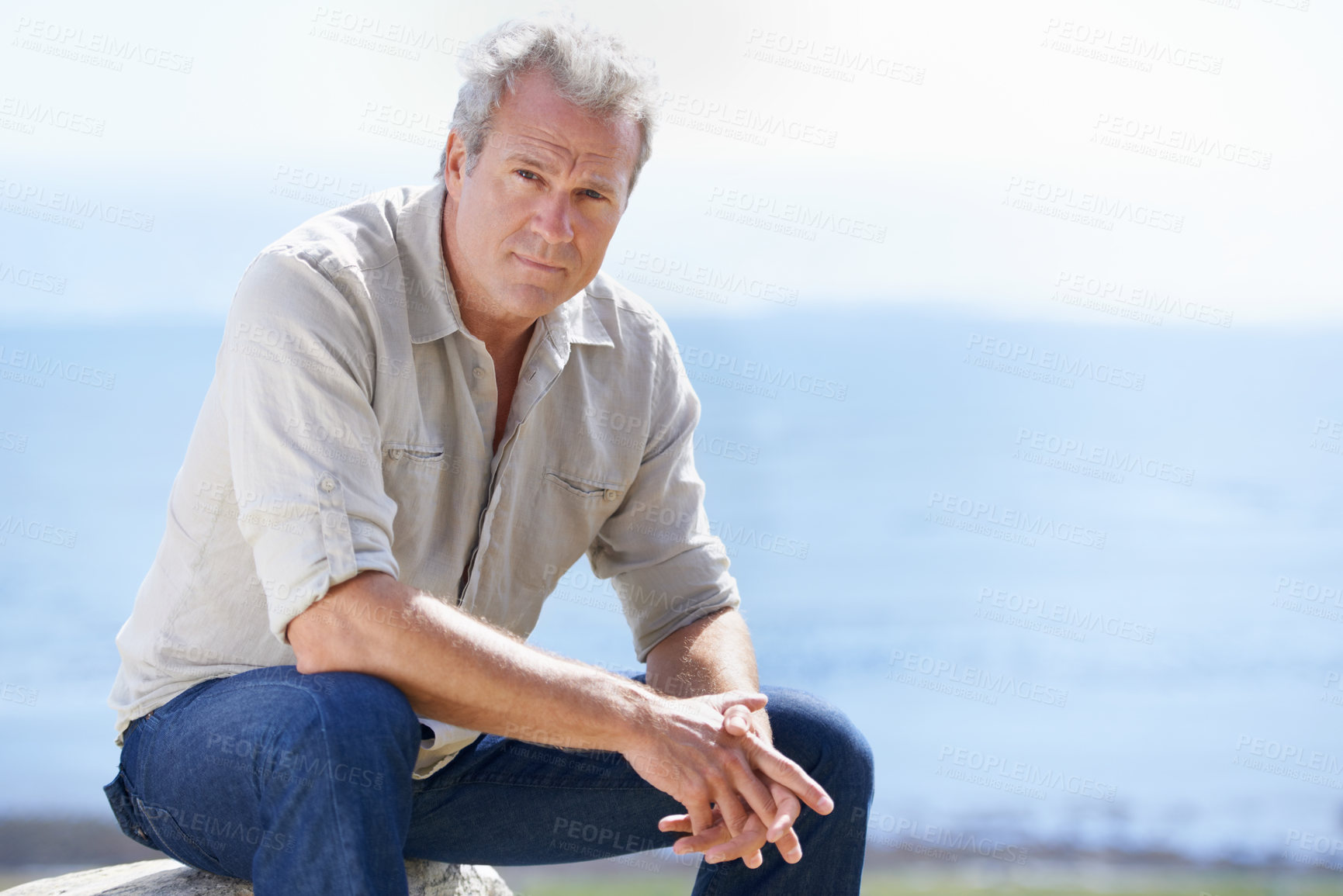 Buy stock photo Portrait of a mature man sitting outdoors