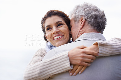 Buy stock photo Couple, face and happy outdoor with hug for romance, love and relationship in nature with date. Mature, man and woman or embrace with smile, marriage and trust for bonding, honeymoon and support 
