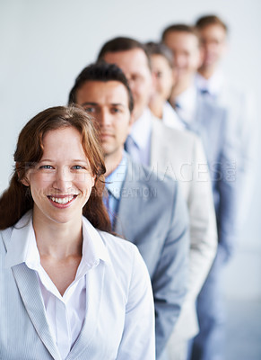 Buy stock photo Woman, portrait and happy for office, row and ready for leader selection process. Workers, corporate accountant in suit and professional in workplace, confident employees and accounting group