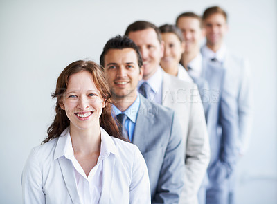 Buy stock photo Woman, portrait and leader in interview row, employees and ready for selection process. Worker, corporate accountant in suit or professional in workplace, colleagues in background and confident