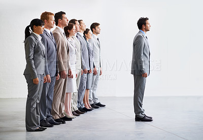 Buy stock photo Businessman, employees and leader with row, workforce, and ready for selection process. Employer, corporate accountant in suit and professional in workplace, people in line and confident