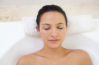 Buy stock photo Bath, relax and face of woman in bathtub for wellness, stress relief or skin detox with comfort at home. Self care, peace or person bathing in a tub for cleaning, pamper or diy spa bathroom treatment