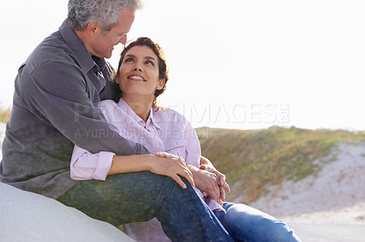 Buy stock photo Couple, face and smile outdoor with hug for romance, love and relationship in nature with relaxing. Mature, man and woman or embrace with happy, peace and comfort for bonding, honeymoon and support 