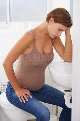 Buy stock photo Vomiting, pregnant woman and morning sickness in bathroom, nausea and uncomfortable. Mirror reflection, moody and frustrated with illness, pregnancy and struggling with migraine pain on sink
