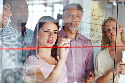 Buy stock photo People in brainstorming meeting, writing ideas on glass for creative business project at marketing startup and teamwork. Woman team leader, collaboration and strategy plan with market research