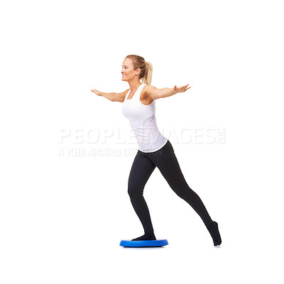 Buy stock photo Balance, health and smile with woman on disk in studio for workout, mindfulness or exercise. Wellness, challenge and training with person on white background for flexibility, fitness or aerobics