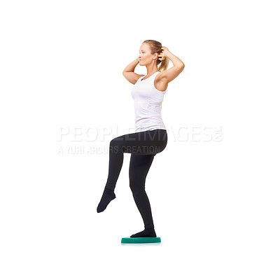 Buy stock photo Balance, health and wellness with woman on disk in studio for workout, body or exercise. Fitness, challenge and training with female person on white background for flexibility, smile or aerobics