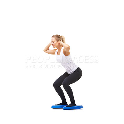 Buy stock photo Balance, exercise and fitness with woman on disc in studio for workout, mindfulness or squats. Wellness, challenge and training with person on white background for flexibility, smile or aerobics