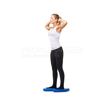 Buy stock photo Balance, health and fitness with woman on disk in studio for workout, mindfulness or exercise. Wellness, challenge and training with person on white background for flexibility, body or aerobics