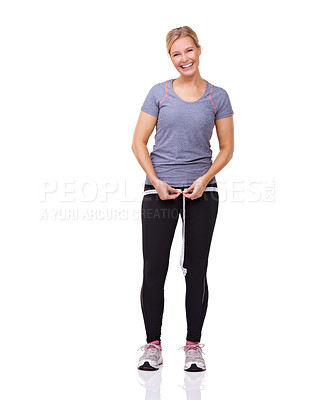 Buy stock photo Fitness, measuring tape and portrait of woman with smile, workout and wellness with healthy body in studio. Health, exercise and happy girl with weight loss measurement isolated on white background.