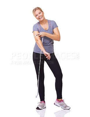Buy stock photo Fitness, measuring tape on arm and portrait of happy woman with smile, workout and wellness with healthy body in studio. Health, exercise and girl with weight loss measurement on white background.