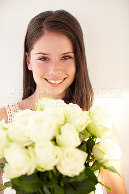 Buy stock photo Portrait, woman and  white roses with beauty, smile and achievement for romance, happiness and excited. Face, man and woman with flower bouquet, celebration or floral gift for joy or romantic gesture