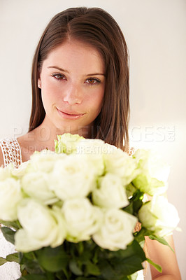 Buy stock photo Portrait, woman or white roses for love, gift or smile for Valentines day, happiness or joy for floral present on studio background. Face, female or lady with flowers, bouquet or cheerful on backdrop