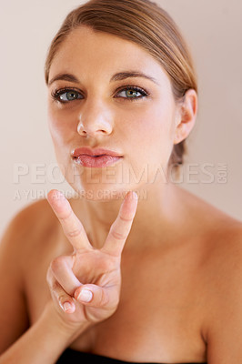 Buy stock photo Beauty, portrait and woman with peace sign for self care wellness, facial cosmetics aesthetic or spa salon routine. Face makeup, dermatology treatment and model with emoji V icon on studio background