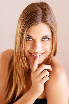 Buy stock photo Makeup secret, portrait studio woman and confidential anti aging routine, facial cosmetics mystery or skincare whisper. Beauty face, emoji shush gesture and model privacy silence on white background
