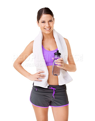 Buy stock photo Portrait, woman and fitness with bottle in studio for thirst, hydration or water mockup on white background. German person, athlete and towel for sweating with refreshing drink for health in wellness