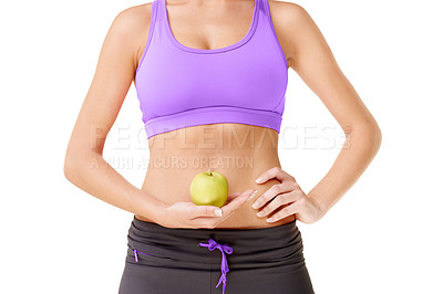 Buy stock photo Woman, apple and stomach for health in studio with mock up for diet for digestion on white background. Female person,  hold and fruit for nutrition, wellness and care with fresh, organic and produce.