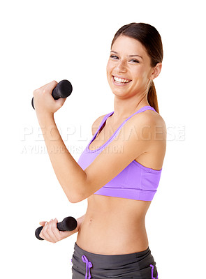 Buy stock photo Shot of a young woman lifting dumbells isolated on white