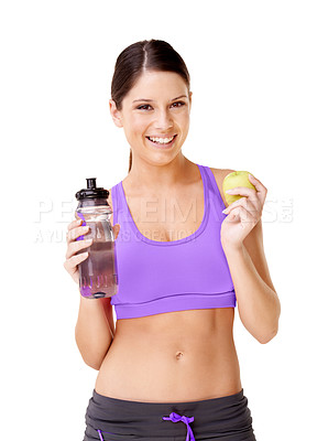 Buy stock photo Woman, apple and water bottle in studio for healthy food choice, wellness and diet on a white background. Portrait of young model or vegan person with green fruit and liquid for detox or weight loss
