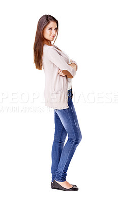 Buy stock photo Studio show of a beautiful young woman standing with her arms folded against a white background