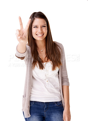 Buy stock photo Portrait, smile and peace sign with a young woman in studio isolated on a white background. Emoji, social media and hand gesture with a happy person in casual clothing for freedom or expression