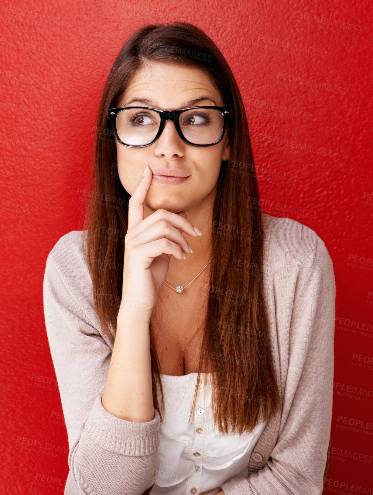 Buy stock photo Woman, face and thinking with glasses for idea, remember or memory against a red studio background. Female person or model in wonder, thought or contemplating decision, choice or doubt on mockup