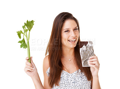Buy stock photo Portrait, celery and chocolate with woman, option and girl isolated on white studio background. Nutrition, person and model with candy, vegan or diet plan with health, wellness or sweet with decision