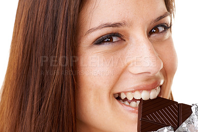 Buy stock photo Smile, eating and portrait of woman with chocolate in a studio for dessert with positive attitude. Happy, face and closeup of young female person enjoying candy for snack isolated by white background
