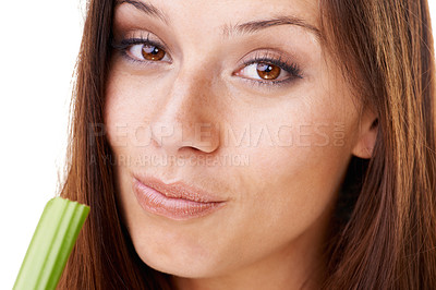 Buy stock photo Nutrition, portrait and woman with celery in a studio for health, wellness and diet snack for lunch. Organic, weight loss and closeup face of young female model eating a vegetable by white background