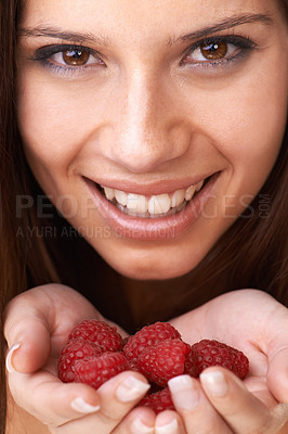 Buy stock photo Face, woman and healthy raspberry fruits in hands for detox, vegan diet and eco nutrition. Portrait, happy girl and holding red berries for organic food, sustainable wellness or benefits of vitamin c
