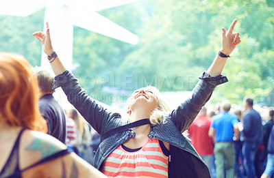 Buy stock photo Woman, dancing and happy outdoor at music festival for freedom, performance and entertainment with crowd. Person, cheering and smile at event, concert or show with audience in nature for summer party
