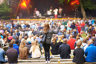 Buy stock photo Back, woman and group at a music festival, cheering and happiness on a weekend break. Female person, people and happy crowd at a party, dancing and joy with fun, excited and celebration for concert