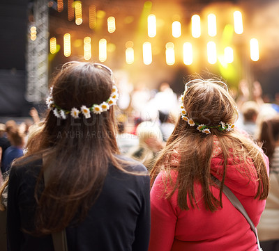 Buy stock photo Women, friends and music festival in audience at outdoor concert, listening to live band. Female people, stage and watching entertainment in park for fun holiday weekend rave, vacation at party event
